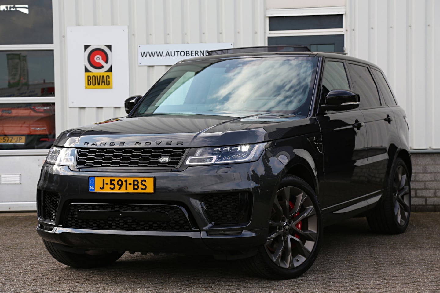 Land Rover Range Rover Sport - 3.0 P400 MHEV HST 4WD Aut.*NL-Auto*1ste Eig!*Perfect LR Onderh.*Carbon/Luchtvering/Pano/AC - AutoWereld.nl