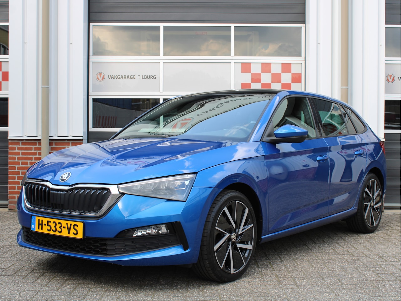 Skoda Scala - 1.0 TSI 116PK Sport Business 1e Eig./NAVI/Panoramadak/Lane assist/Trekhaak/PDC/Schalensitz - AutoWereld.nl