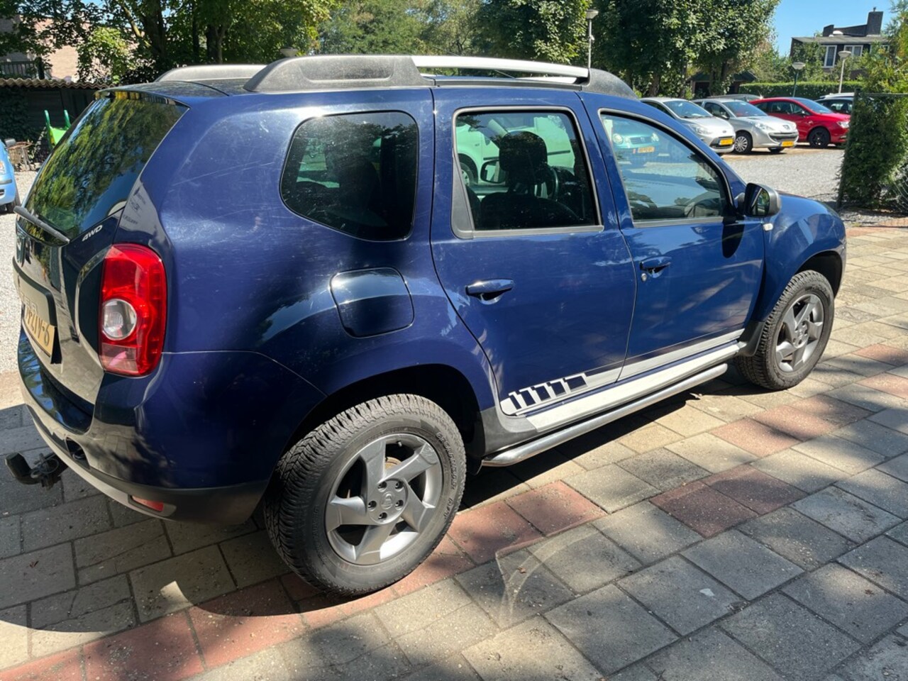 Dacia Duster - 16. 4WIEL DRIV 1.6 Prestige - AutoWereld.nl