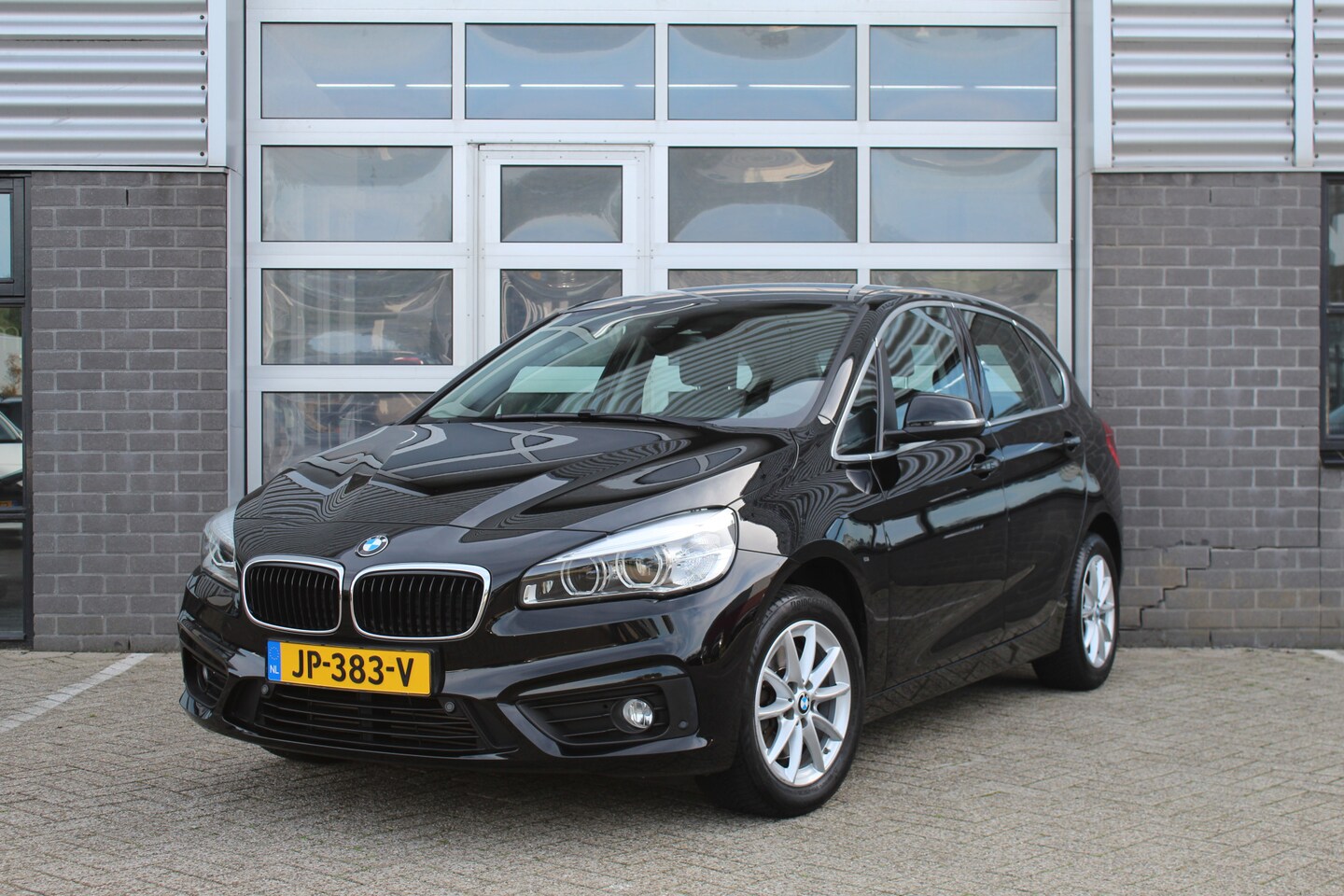 BMW 2-serie Active Tourer - 218i Centennial High Executive / Navigatie / Leer / HUD / N.A.P. - AutoWereld.nl