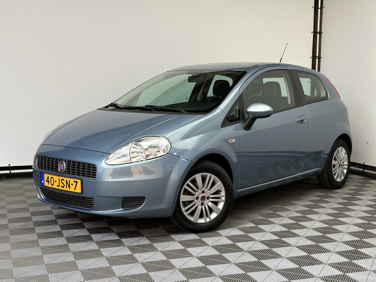 Fiat Grande Punto - 1.2 Edizione Lusso 3-drs Airco LM15" NL Auto - AutoWereld.nl