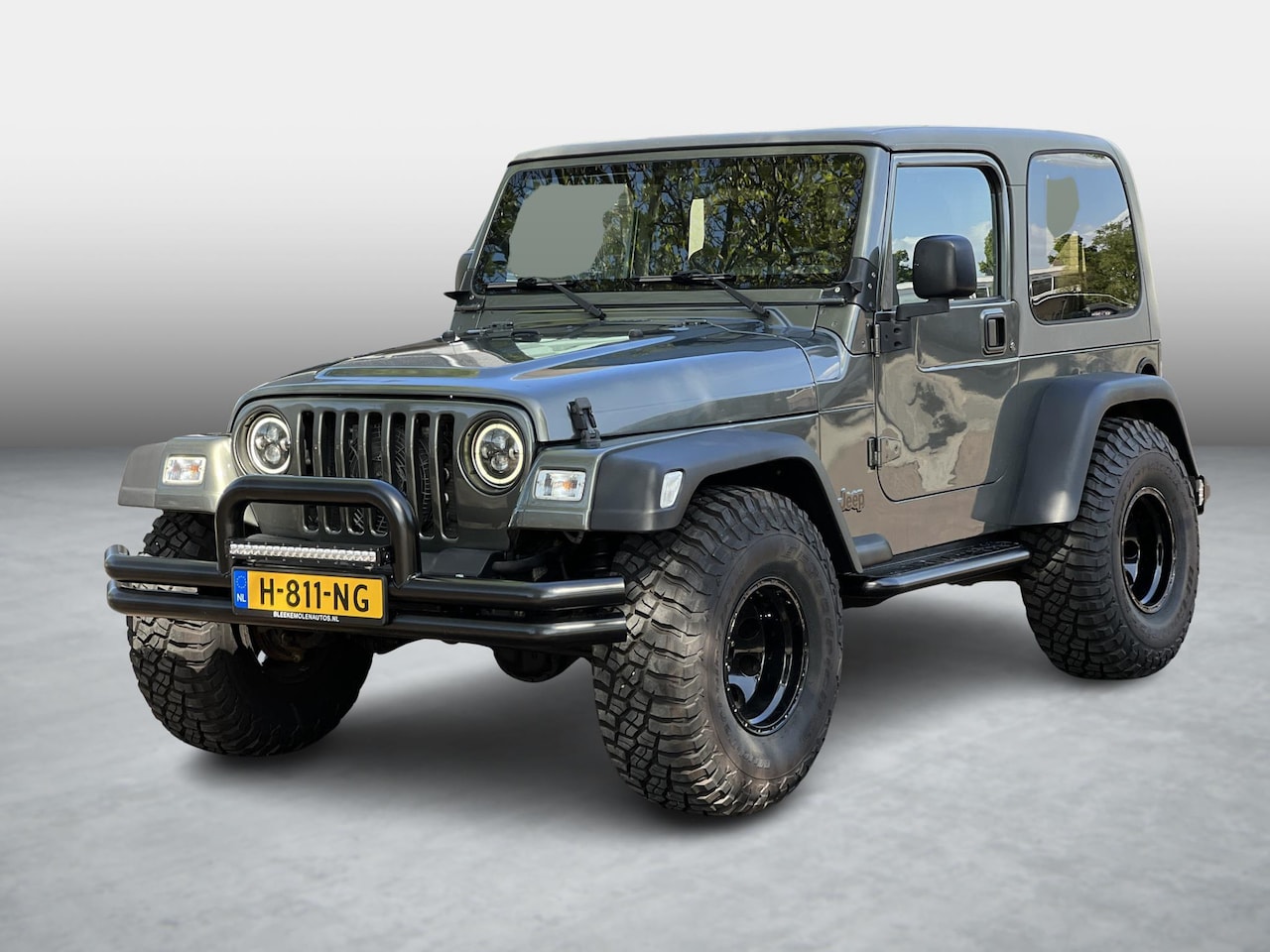 Jeep Wrangler - 4.0i Hardtop custom automaat airco - AutoWereld.nl