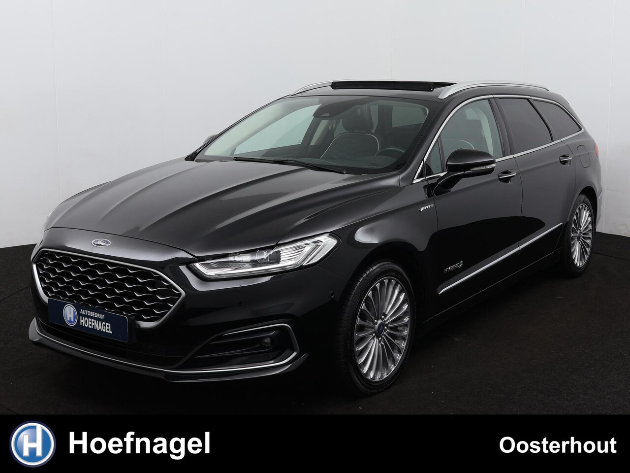 Ford Mondeo Wagon - 2.0 IVCT HEV Vignale AUTOMAAT - PANORAMADAK - Adaptive Cruise Control - Winter Pack - 18"L - AutoWereld.nl