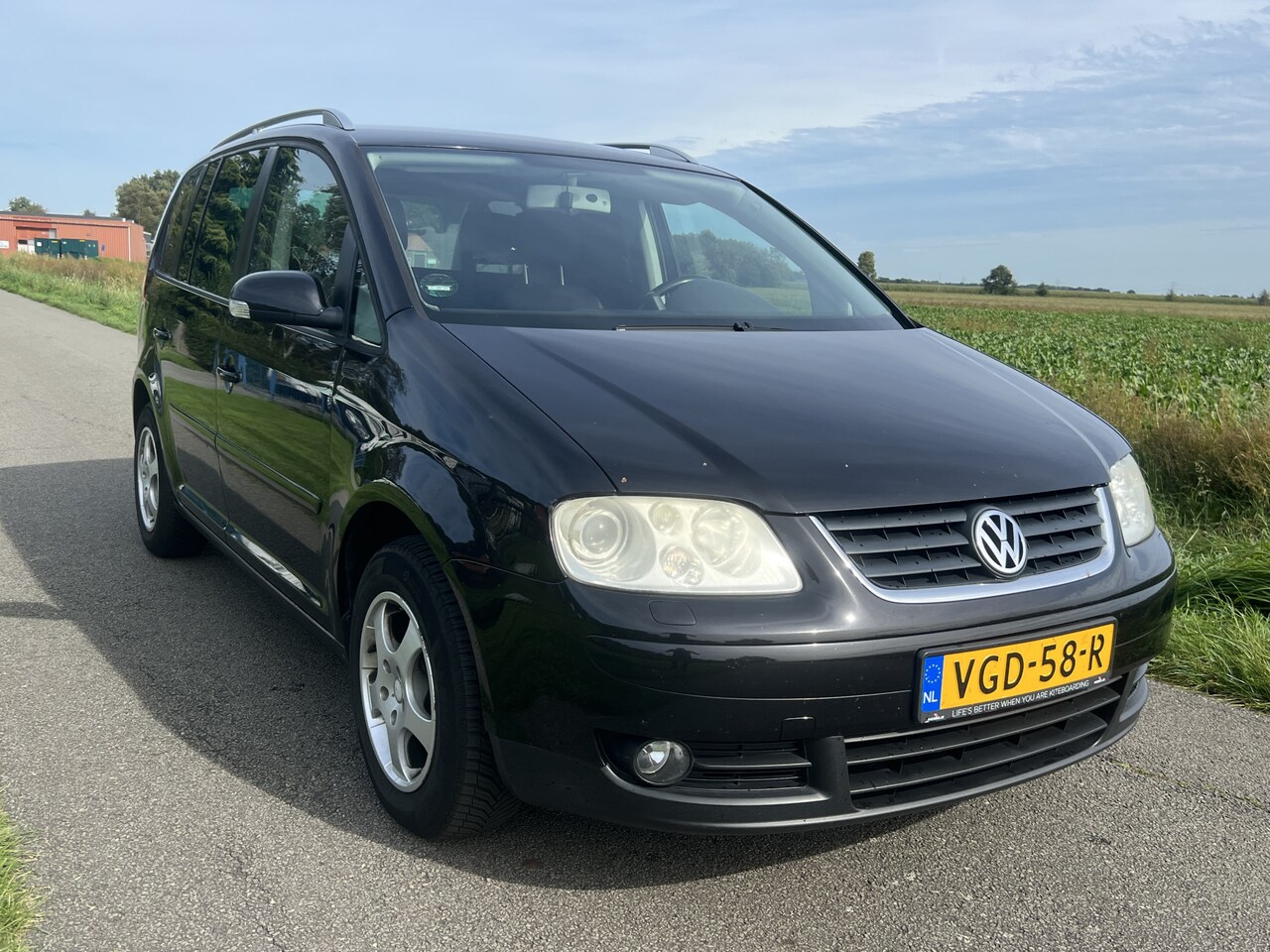 Volkswagen Touran - 2.0 TDI Highline Grijs kenteken / AUTOMAAT - AutoWereld.nl