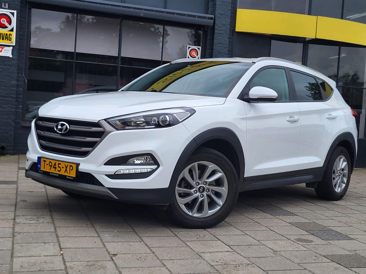 Hyundai Tucson - 1.6 GDi i-Motion | Park. Camera | Stoelverwarming | Tel | navigatie | Cruise Control | - AutoWereld.nl