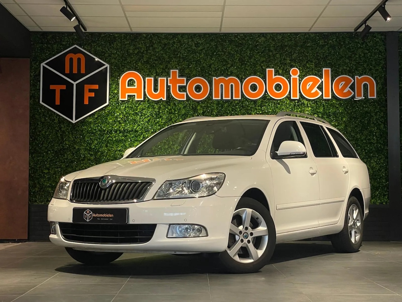 Skoda Octavia Combi - 1.8 TSI Elegance Business - AutoWereld.nl