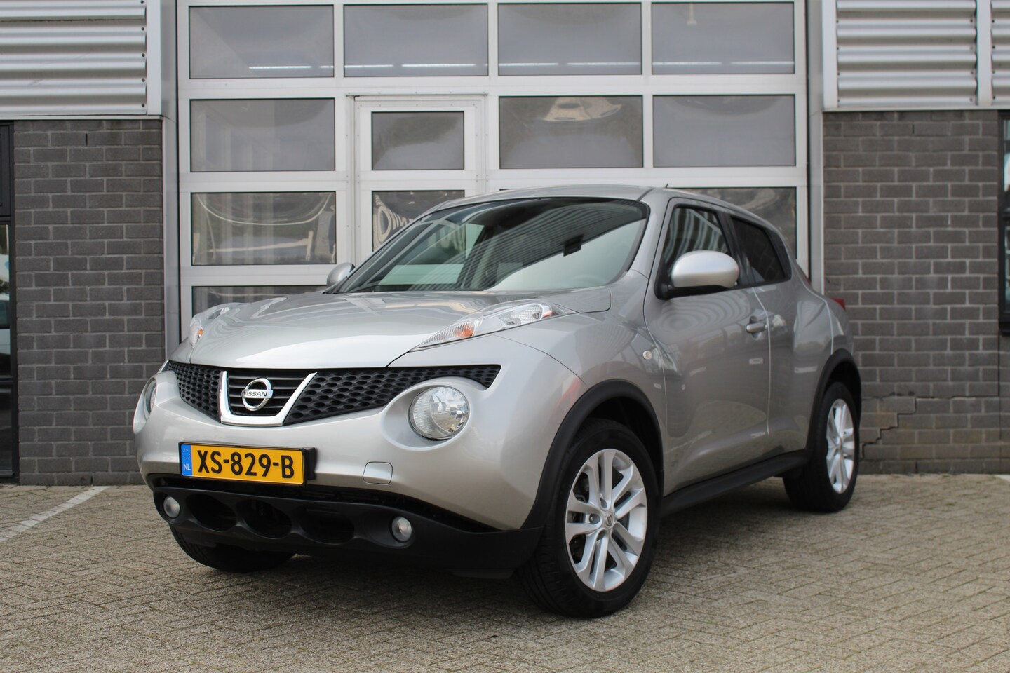 Nissan Juke - 1.6 Tekna / Automaat / Leer / Navigatie / Camera - AutoWereld.nl