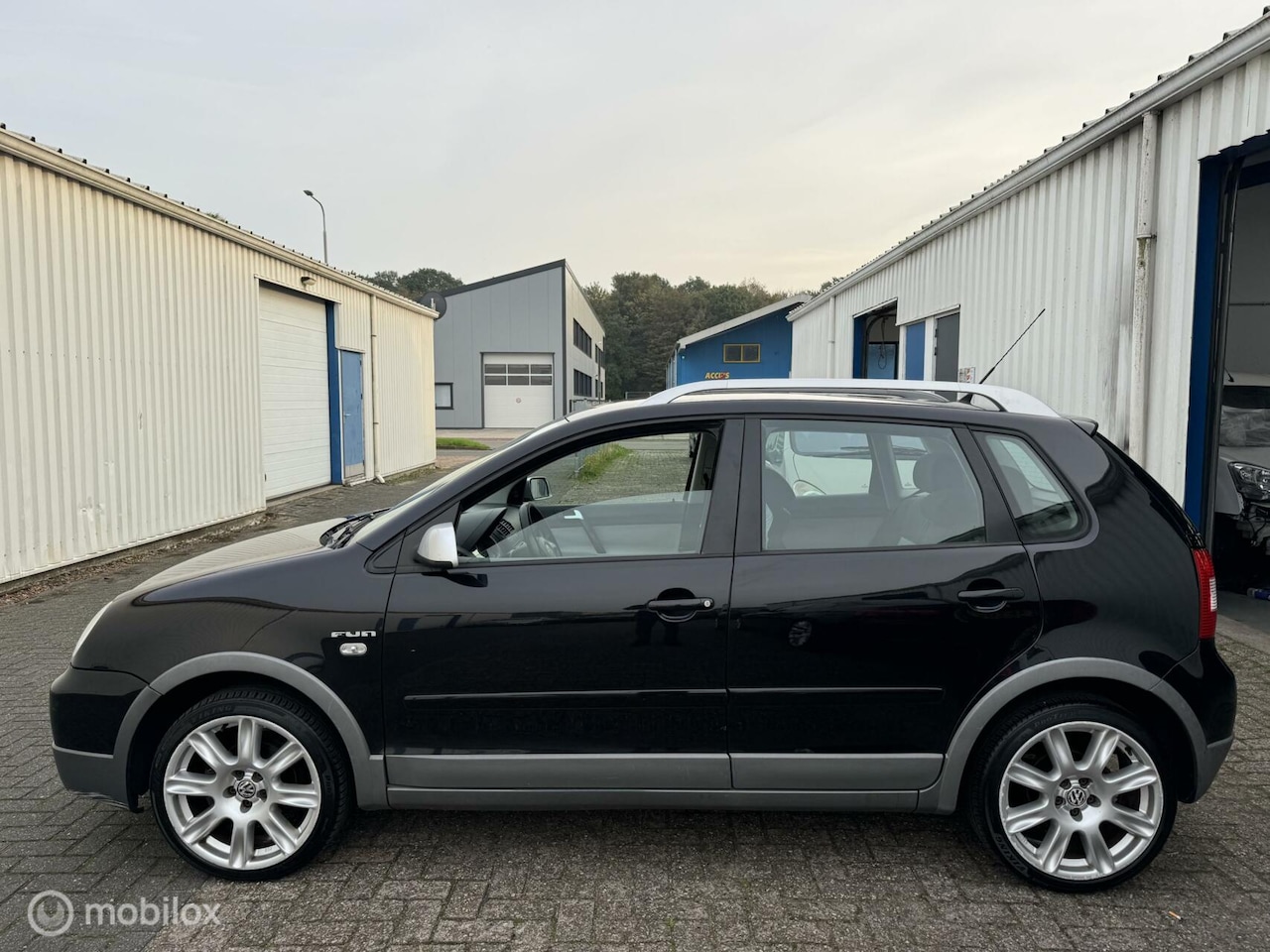 Volkswagen Polo - 1.4-16V FUN Cross | Hoge Instap | APK - AutoWereld.nl