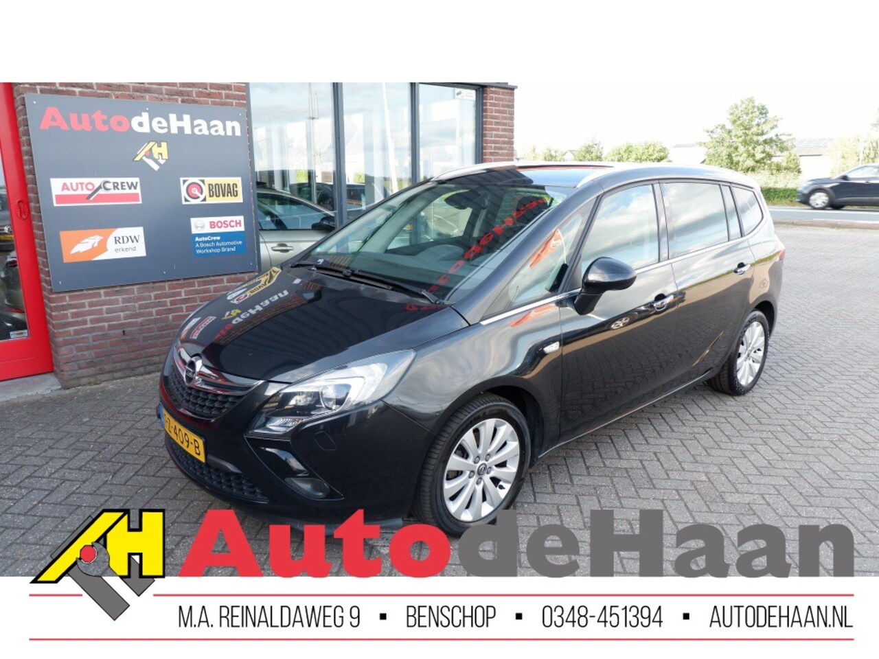 Opel Zafira Tourer - 2.0 CDTI Cosmo 7p. Navi/Cruise/PDC/Trekhaak - AutoWereld.nl