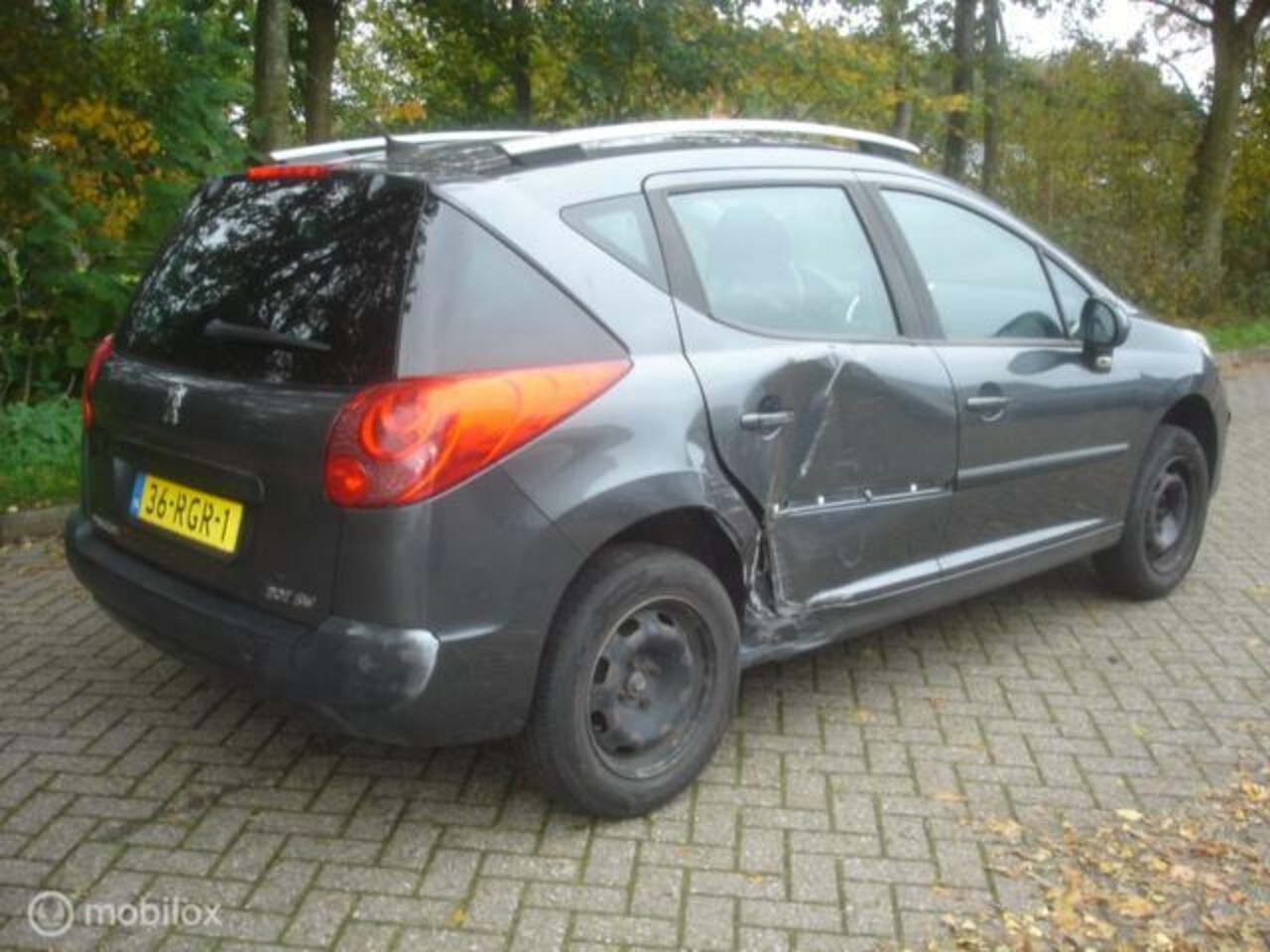 Peugeot 207 SW - 1.4 X-line Zijschade en Distributie defect - AutoWereld.nl