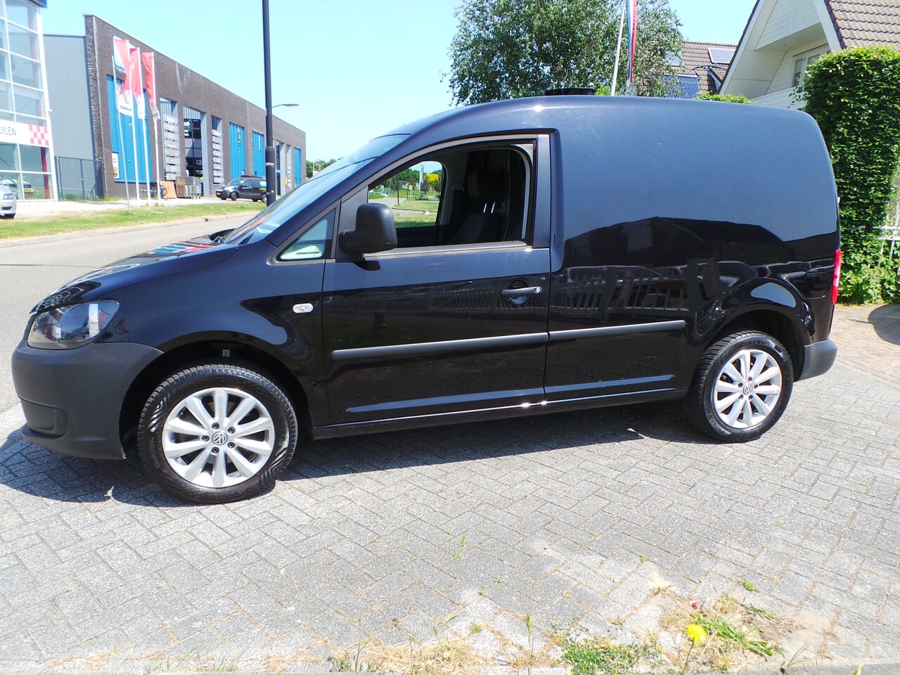 Volkswagen Caddy - 1.6 TDI 102pk DSG Airco,Cruise,Navi,Pdc,Lmv,Trekh - AutoWereld.nl