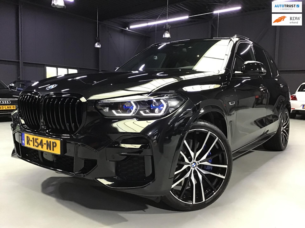 BMW X5 - XDrive45e High Executive I M-Sport I Panodak I 22 Inch I Luchtvering I Laser I HUD I Indiv - AutoWereld.nl