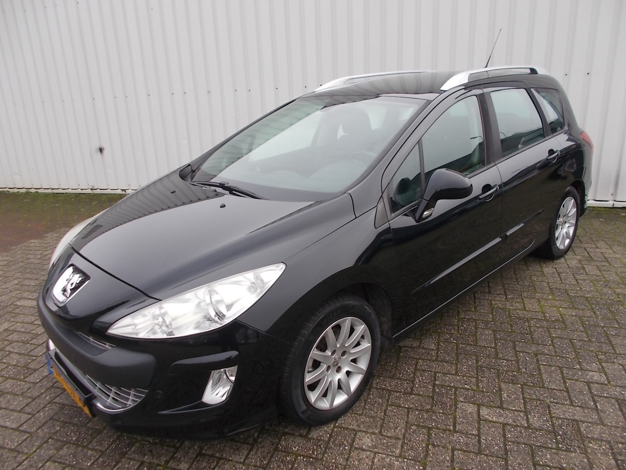 Peugeot 308 SW - 1.6 HDiF XS 1.6 HDiF XS ( APK 05-03-2024 ) - AutoWereld.nl