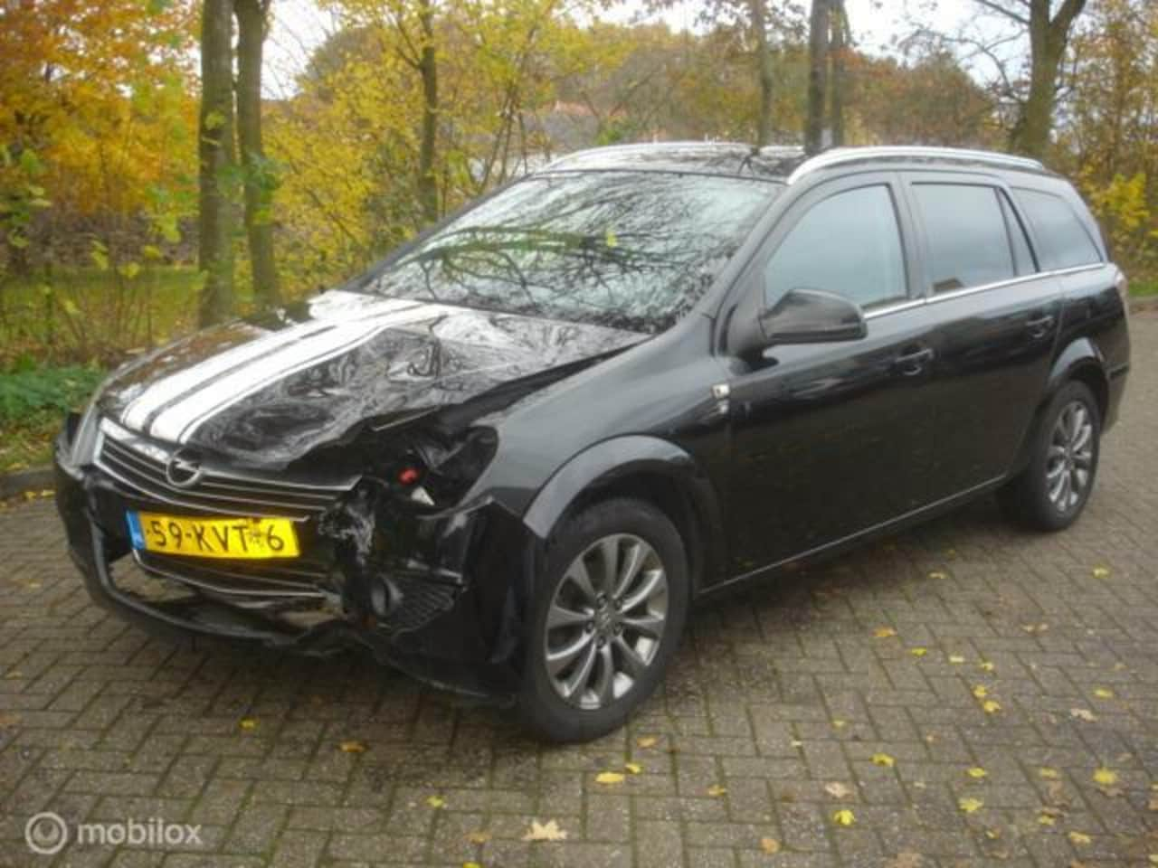 Opel Astra Wagon - 1.6 111 years Edition Airco Voorschade - AutoWereld.nl