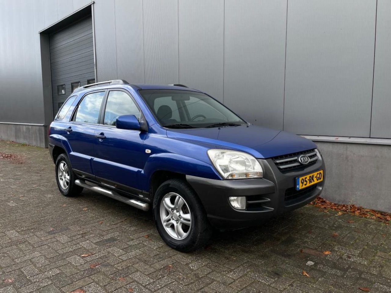 Kia Sportage - 2.0 CVVT Comfort|Apk|Airco - AutoWereld.nl