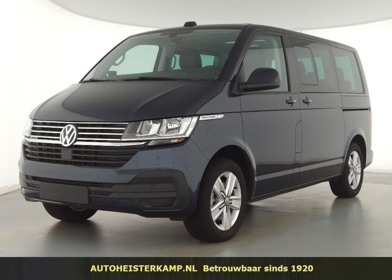 Volkswagen Multivan - Comfortline Grijs Kenteken 2.0 TDI 204 PK Automaat 2 Schuifdeuren Trekhaak Navi Camera - AutoWereld.nl