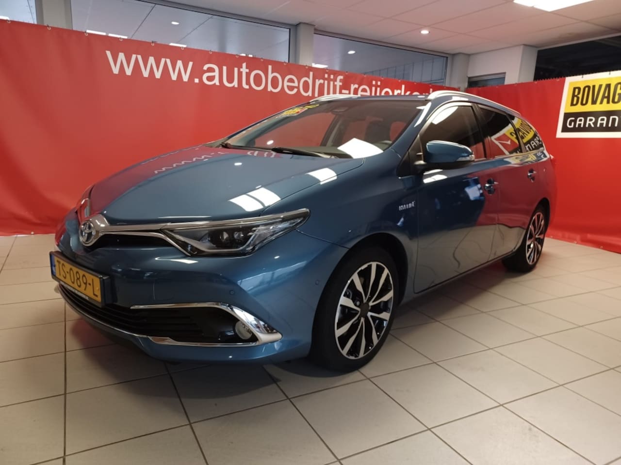 Toyota Auris Touring Sports - 1.8 Hybr. Executive - AutoWereld.nl