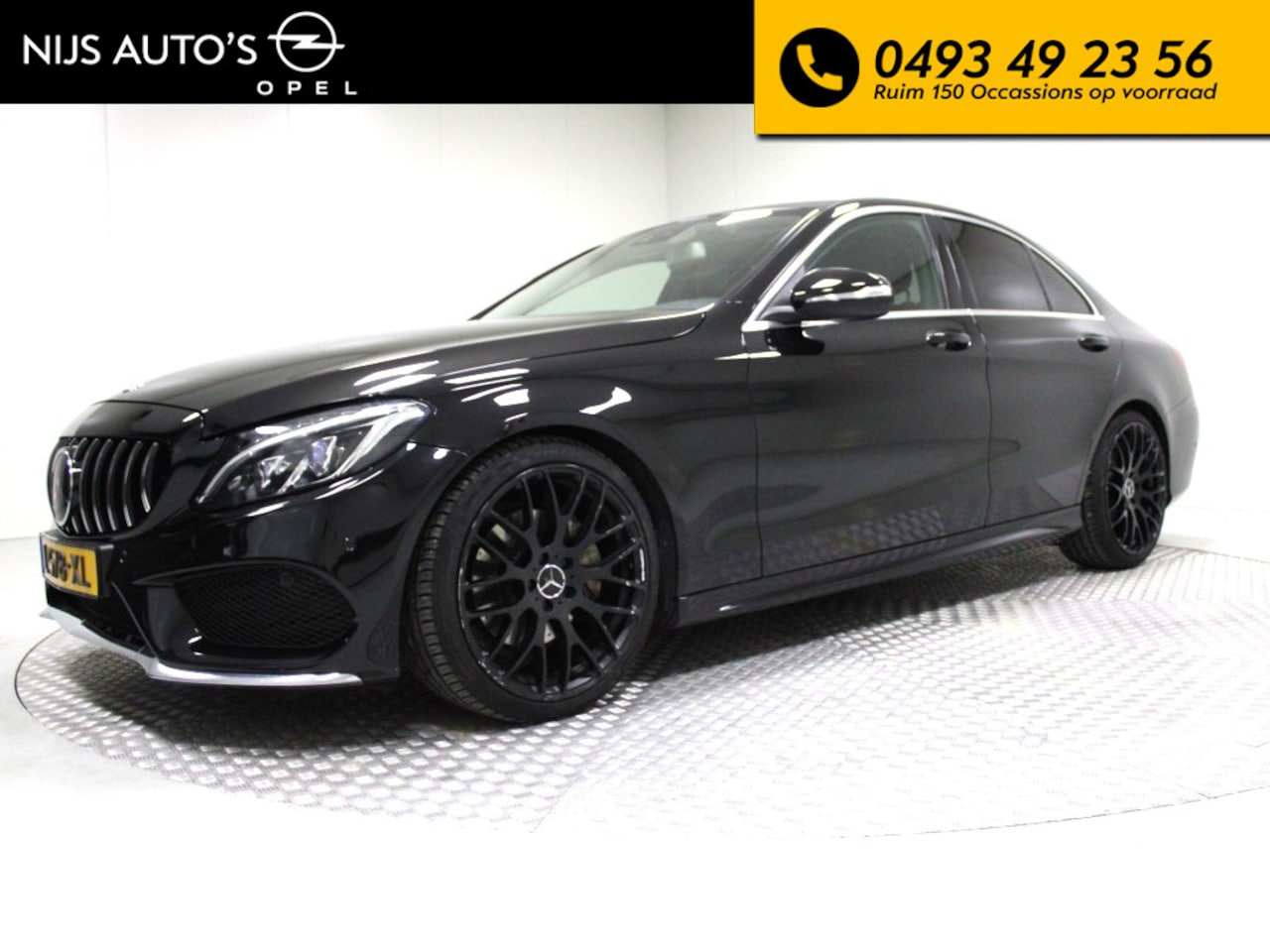 Mercedes-Benz C-klasse - 200 Prestige | 184 pk | AMG-styling | automaat | navi fullmap | climate | pdc v/a + camera - AutoWereld.nl