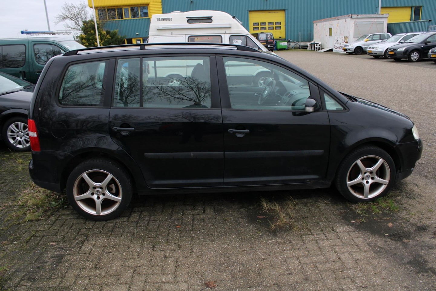 Volkswagen Touran - 1.6-16V FSI Athene 7 Persoons - AutoWereld.nl