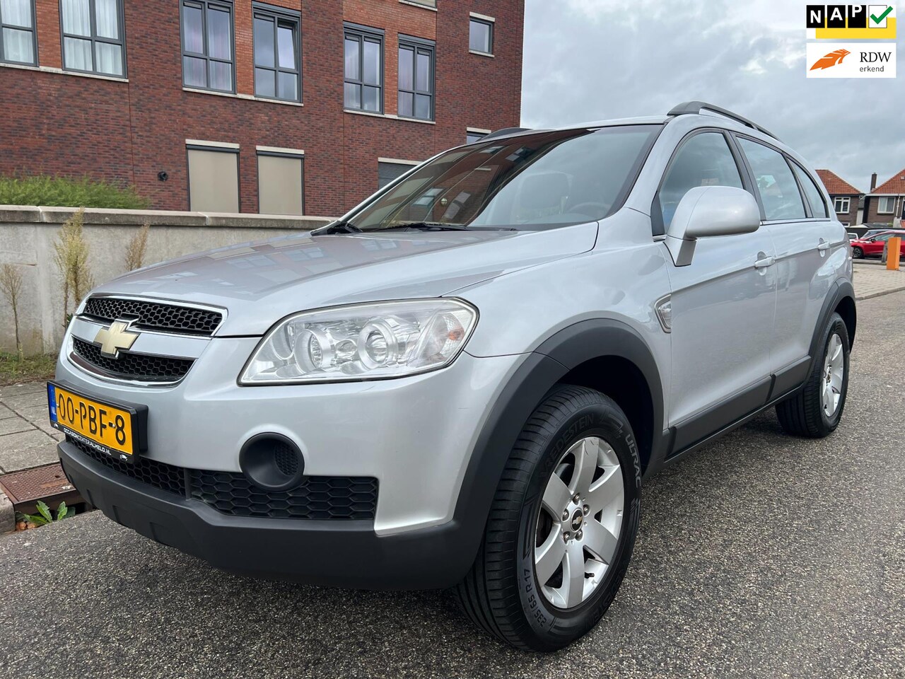 Chevrolet Captiva - 2.4i Style 2WD 7p. /Airco/PDC/NAVI/Camera/LMV - AutoWereld.nl