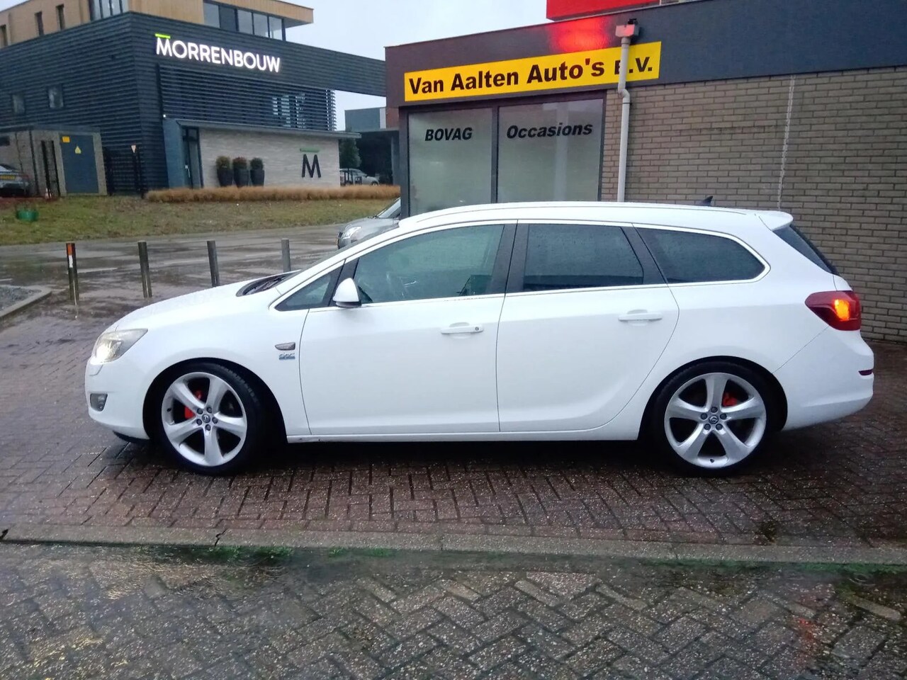 Opel Astra Sports Tourer - 1.4 Turbo Sport 1.4 Turbo Sport - AutoWereld.nl