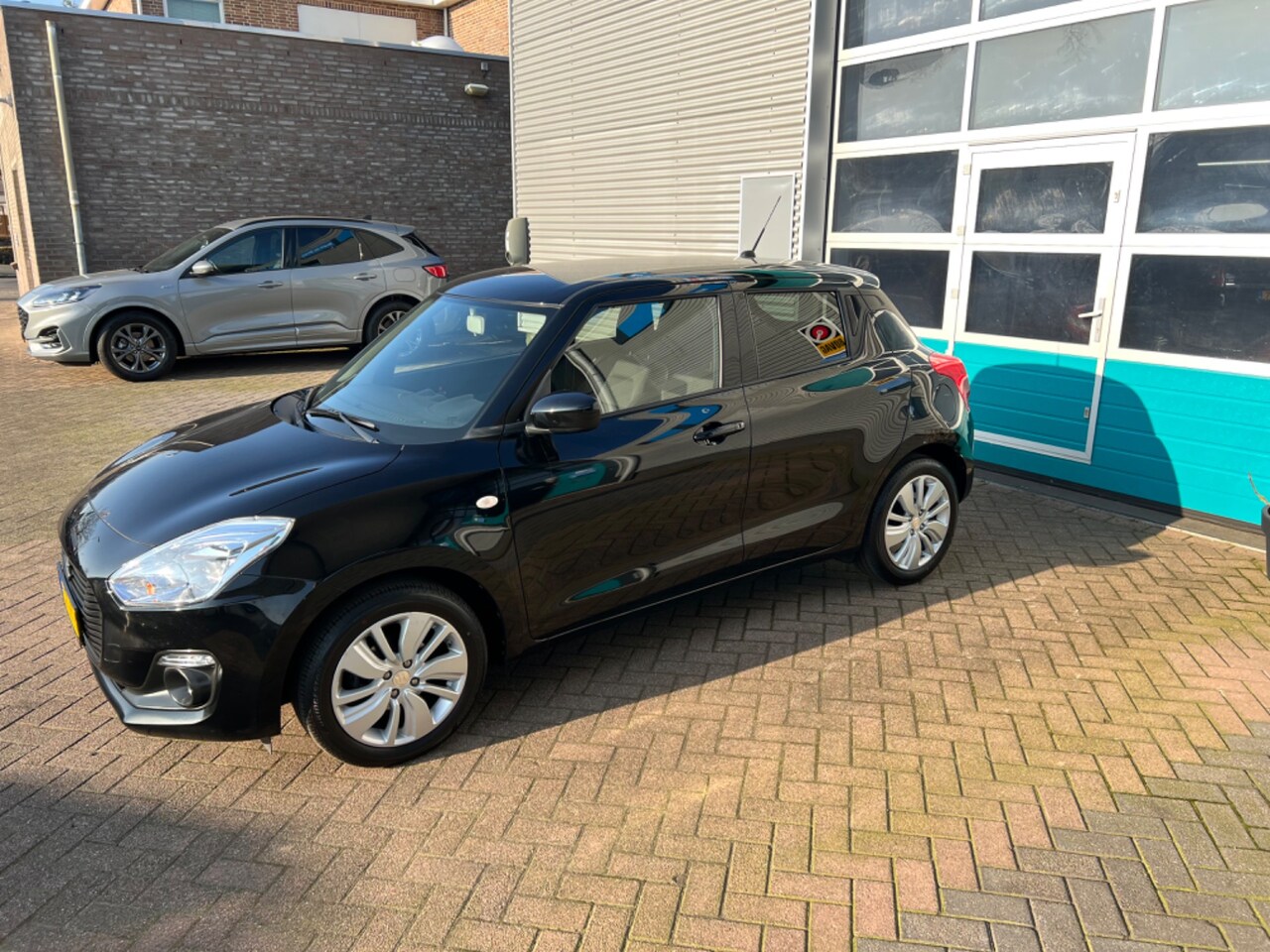 Suzuki Swift - 1.2 DualJet 90pk Comfort - AutoWereld.nl