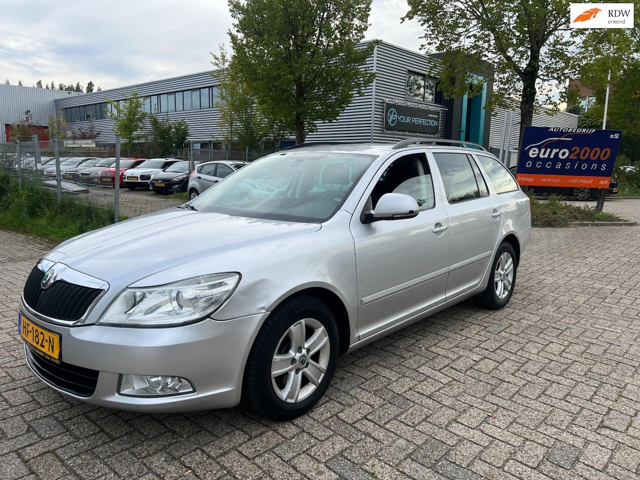 Skoda Octavia Combi - 1.6 TDI Greentech Elegance - NAVIGATIE ! - AutoWereld.nl