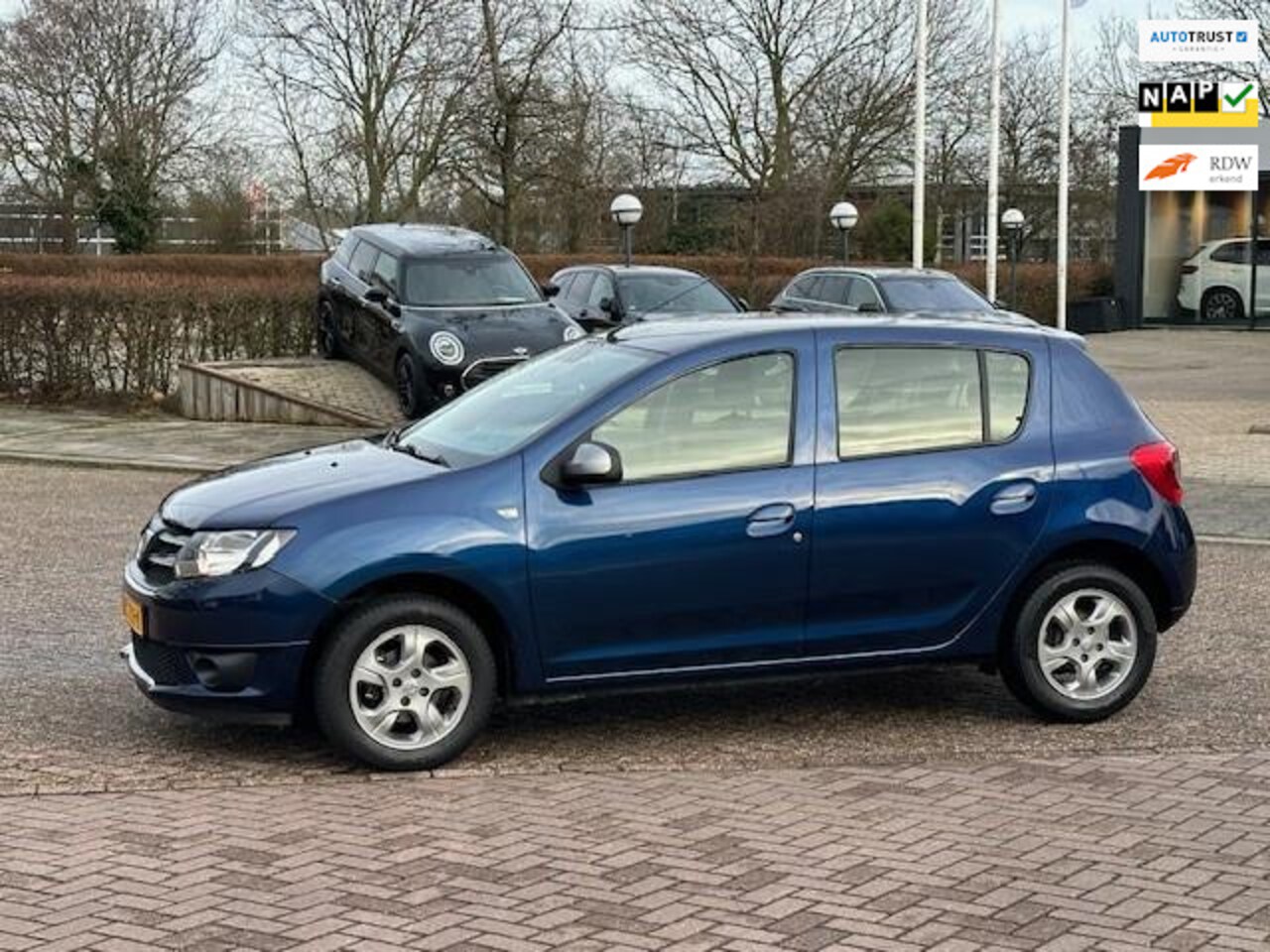 Dacia Sandero - 0.9 Tce 10th Anniversary 0.9 TCe 10th Anniversary,bj.2015,blauw,airco,NAP met 123459 km.en APK tot 12/2024,sportvel - AutoWereld.nl