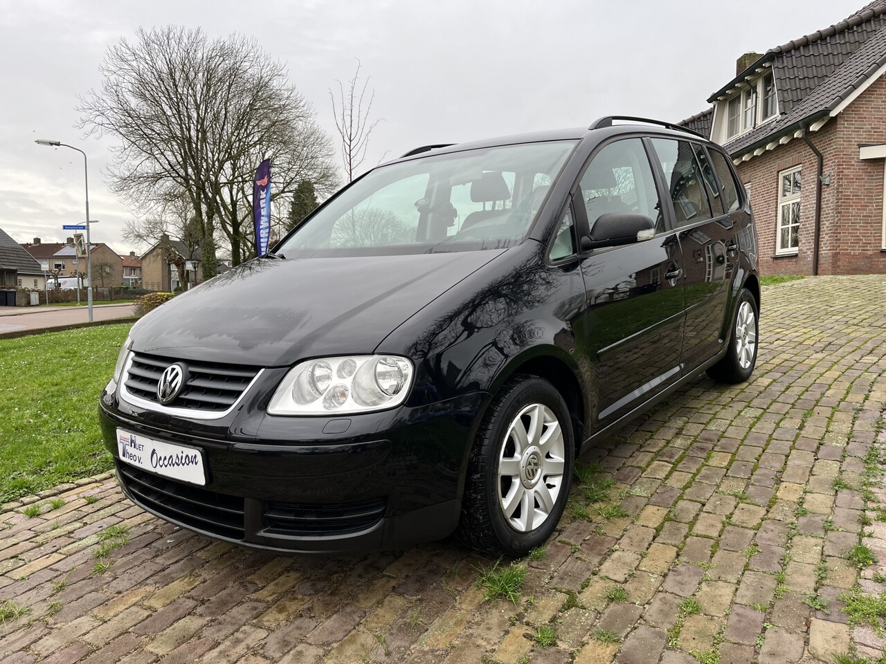 Volkswagen Touran - 1.6 Optive Airco/Cruise/Parkeersensor achter - AutoWereld.nl