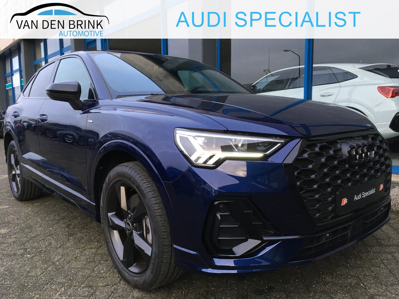 Audi Q3 Sportback 45 TFSI e SLine Sonos Navarra blauw 2022 Hybride