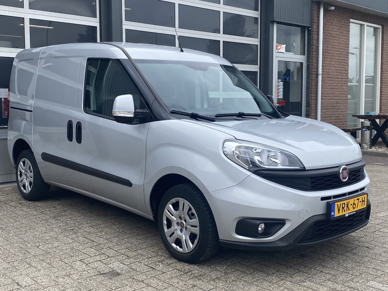 Fiat Doblò Cargo - 1.3 MJ L1H1 SX Marge Btw en Bpm vrij Airco Cruise controle Navigatie Tussenschot Parkeerhu - AutoWereld.nl