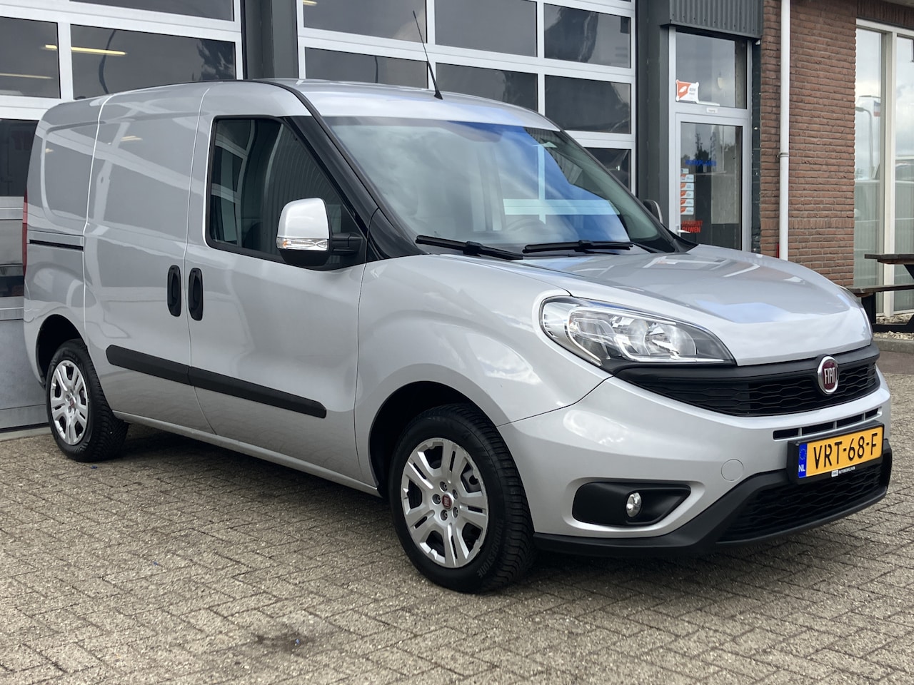 Fiat Doblò Cargo - 1.3 MJ L1H1 SX 90pk 20x op voorraad Btw en Bpm vrij Airco Cruise controle Navigatie Tussen - AutoWereld.nl