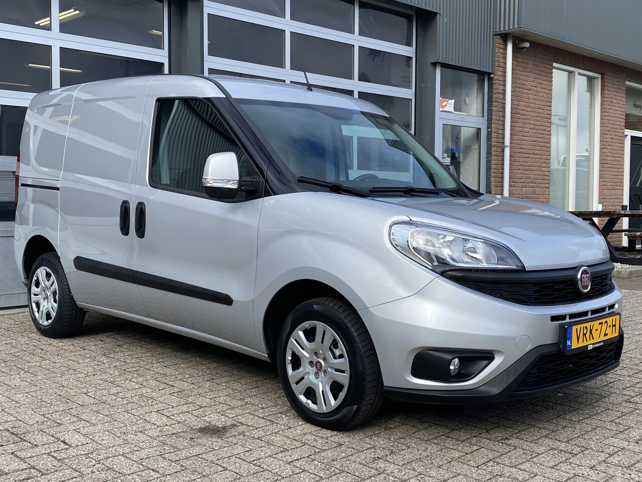 Fiat Doblò Cargo - 1.3 MJ L1H1 SX 90pk Btw en Bpm vrij Airco Cruise controle Navigatie Tussenschot Parkeerhul - AutoWereld.nl