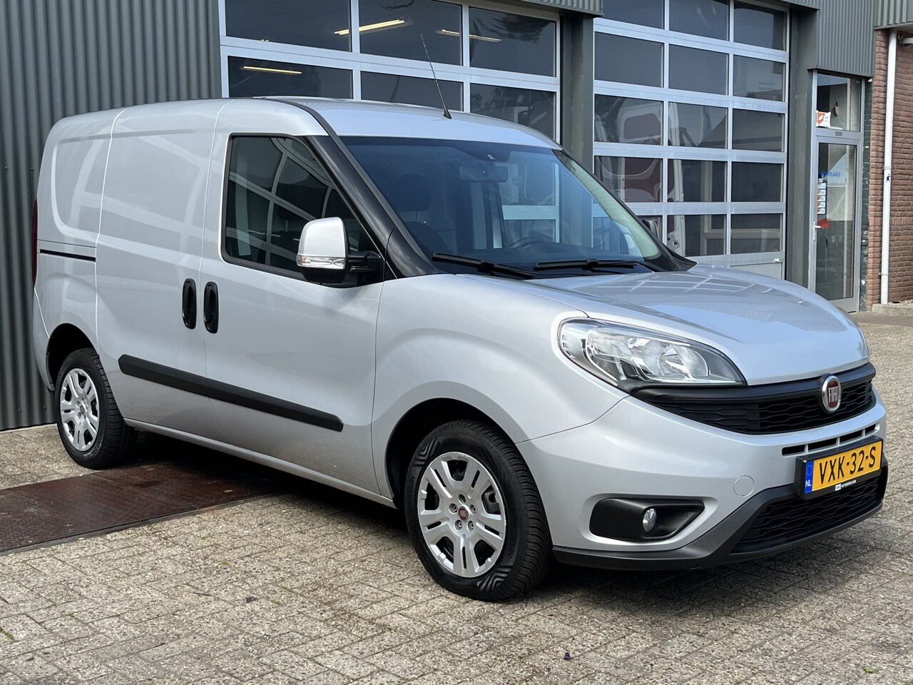 Fiat Doblò Cargo - 1.3 MJ L1H1 SX 20x op voorraad Btw en Bpm vrij Airco Cruise controle Laderkasten Navigatie - AutoWereld.nl