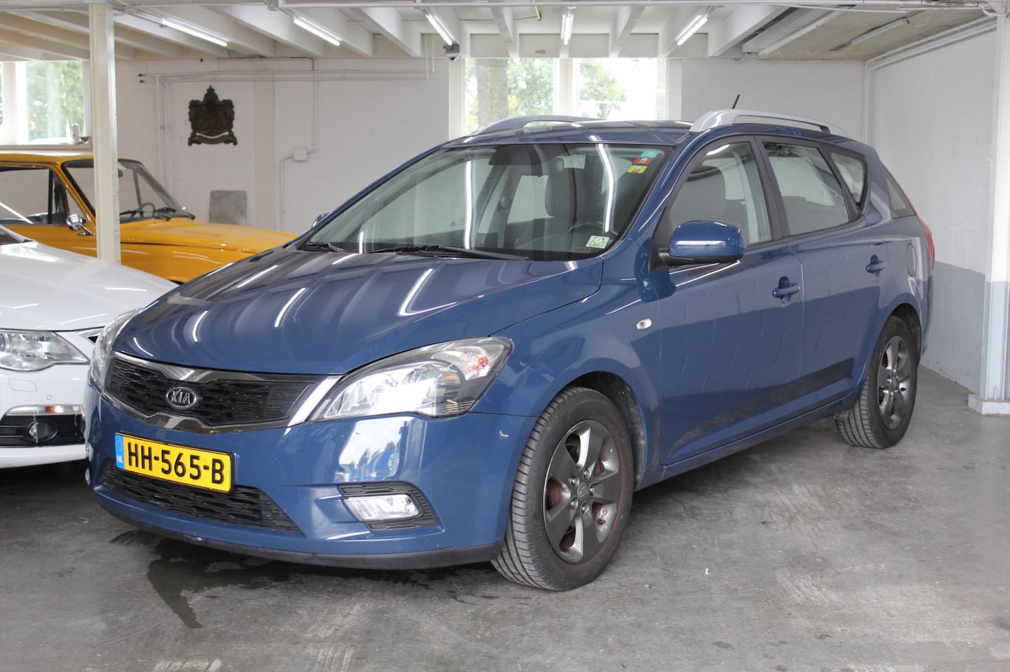 Kia Cee'd Sporty Wagon - 1.4 CVVT Seven 1.4 CVVT Seven - AutoWereld.nl