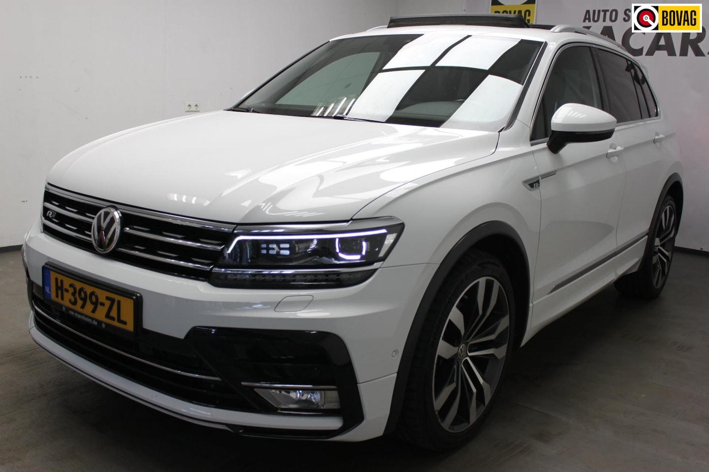 Volkswagen Tiguan - 2.0 TDI Sport&Style 4Motion PANORAMADAK ! R LINE ! GARANTIE ! - AutoWereld.nl