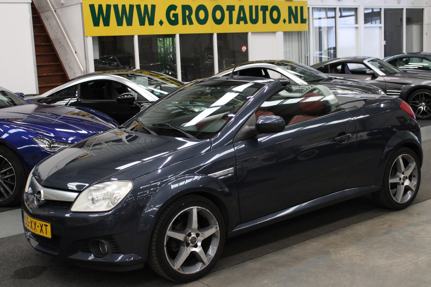 Opel Tigra TwinTop - 1.4-16V Temptation Airco, Cabrio, NAP, Stuurbekrachtiging - AutoWereld.nl