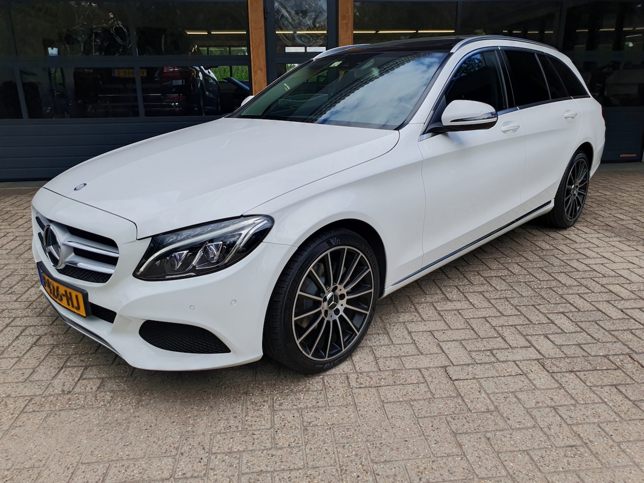 Mercedes-Benz C-klasse Estate - 180 Prestige NAVI * LED * PANORAMA DAK * ILS * LINE ASSIST * DODE HOEK ASS * - AutoWereld.nl