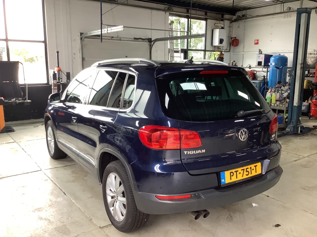 Volkswagen Tiguan - 1.4 TSI Sport&Style 4Motion - AutoWereld.nl