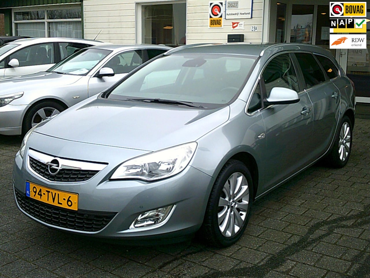 Opel Astra Sports Tourer - 1.4 Turbo Cosmo 1.4 Turbo Cosmo (NAV/LMV/ECC) - AutoWereld.nl