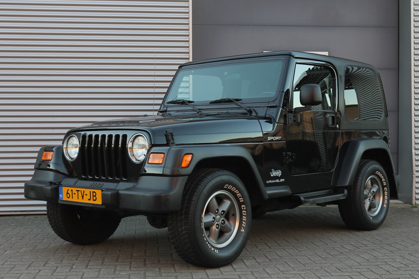 Jeep Wrangler - 2.4i Sport I SPOFTTOP I HARDTOP I 73000 KM - AutoWereld.nl