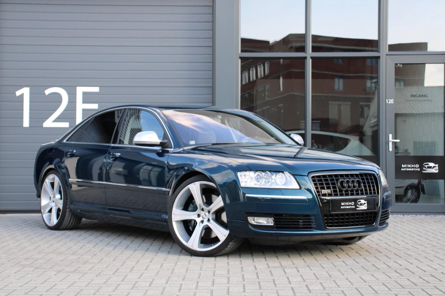 Audi A8 - 6.0 W12 q. Pro Line+ Metallic green|Stoelverwarming|Bose - AutoWereld.nl