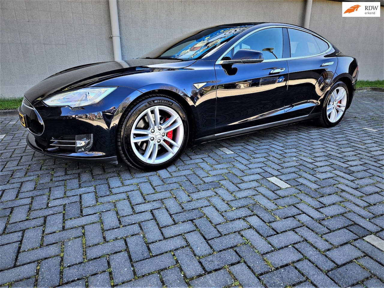 Tesla Model S - 85D Performance*€ 27.000 NETTO*700PK AUTOPILOT/PANODAK/LUCHTVERING - AutoWereld.nl