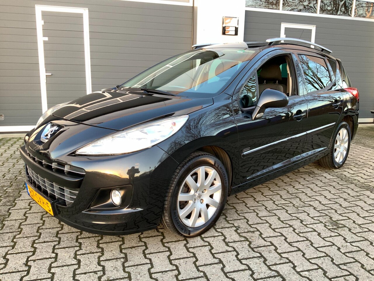 Peugeot 207 SW - 1.6 VTi Sportium Airco Trekhaak - AutoWereld.nl