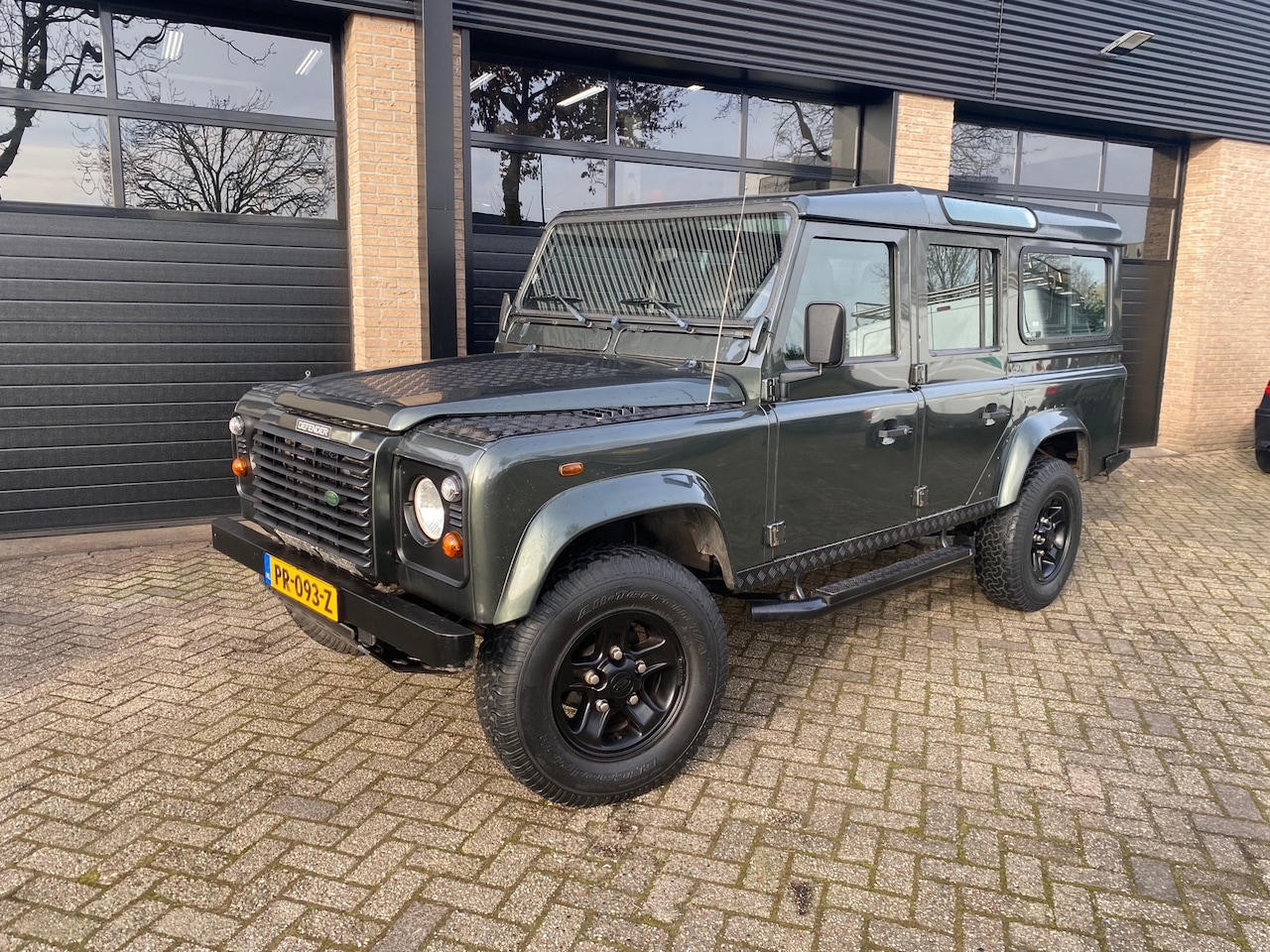 Land Rover Defender - 2.5 TD5 110 SW SE 9 persoons Airco - AutoWereld.nl