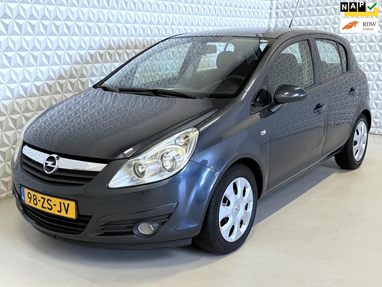 Opel Corsa - 1.2-16V Enjoy 5drs AIRCO - Koppakking lek?! (2008) - AutoWereld.nl