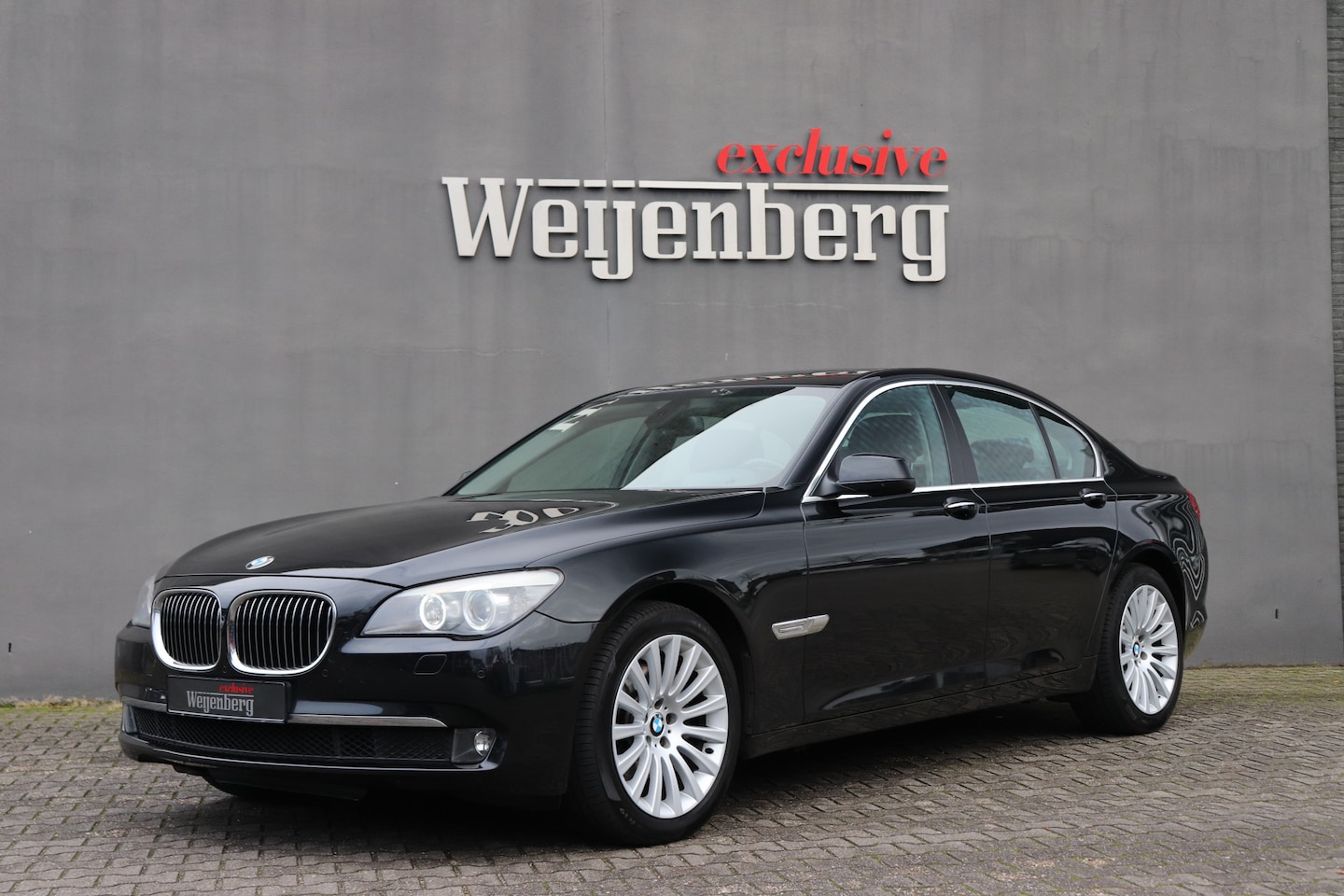 BMW 7-serie - 740i High Executive Pano Zwart Leder - AutoWereld.nl