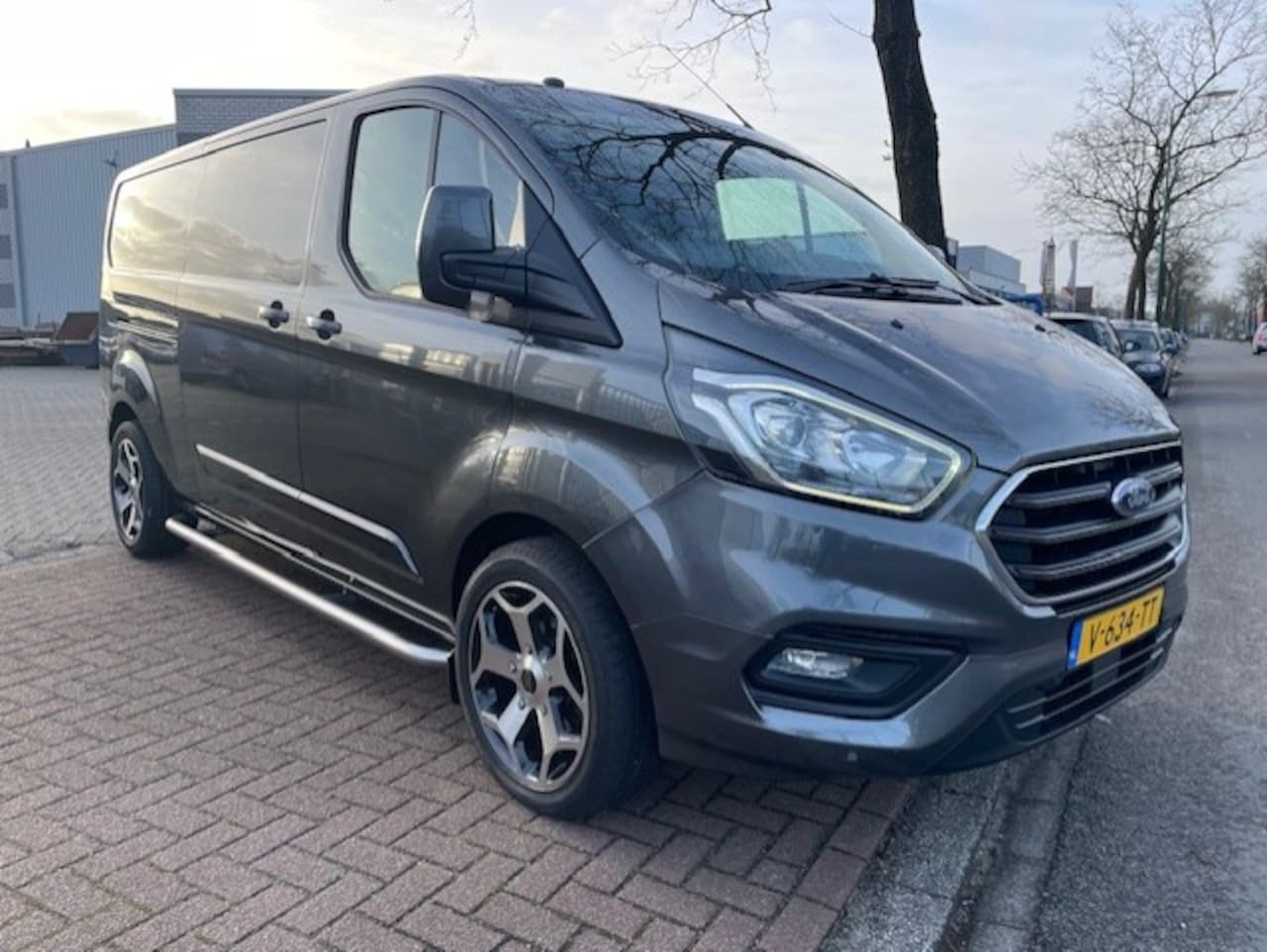 Ford Transit Custom - 300 2.0 TDCI 170pk L2 H1 Limited Automaat Airco/ECC,Navigatie,Camera,Xenon - AutoWereld.nl