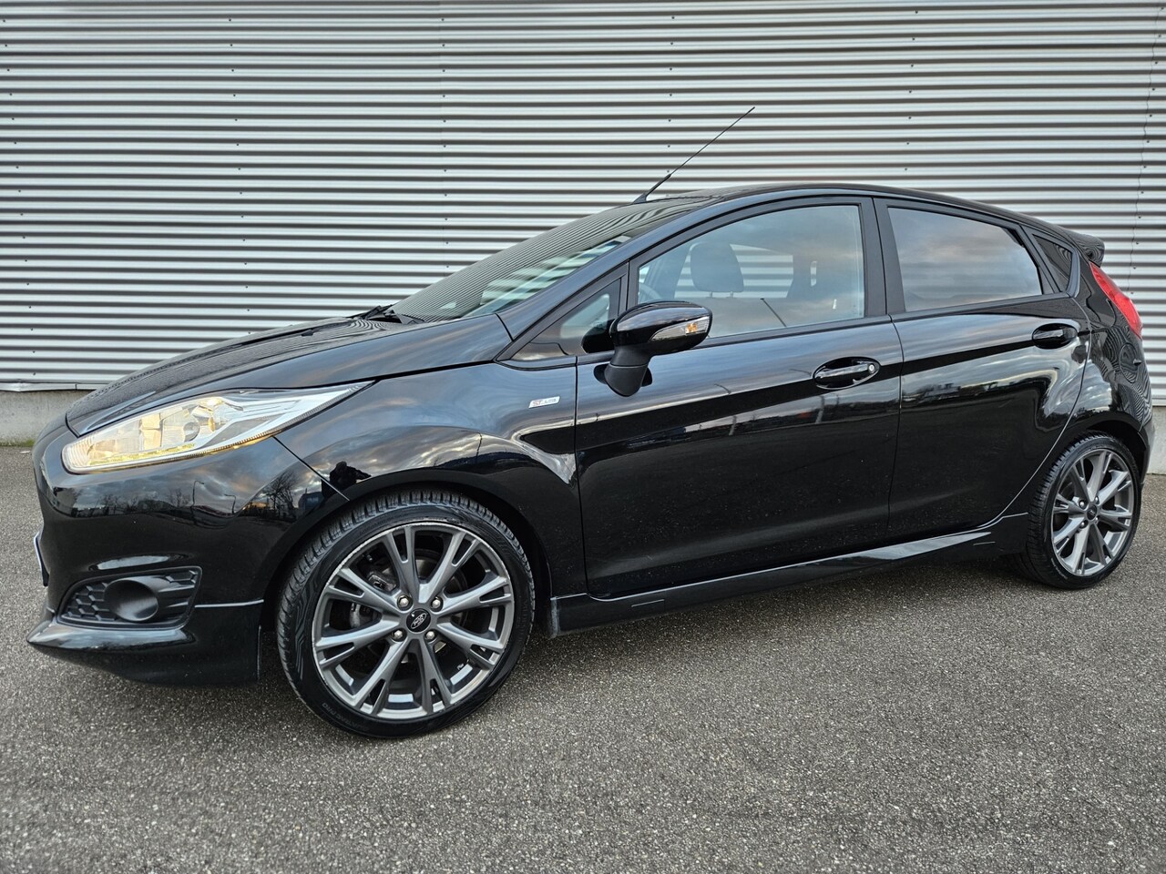 Ford Fiesta - 1.0 EcoBoost ST Line Climatronic navigatie cruisecontrol PDC NAP nieuwstaat - AutoWereld.nl