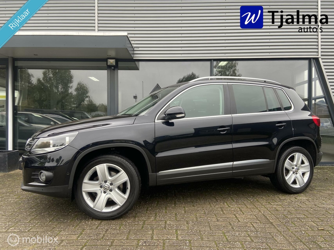 Volkswagen Tiguan - 1.4 TSI Sport Style - AutoWereld.nl